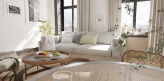 a living room filled with furniture and lots of windows