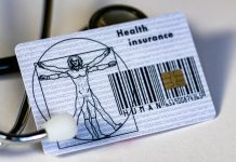 a card with a picture of a man on it next to a stethos