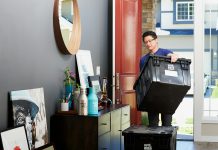 man in blue polo shirt sitting on chair