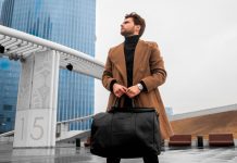 a man holding a briefcase