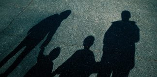 2 person walking on the street