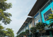 a street with cars and buildings