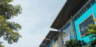 a street with cars and buildings