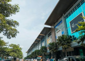 a street with cars and buildings