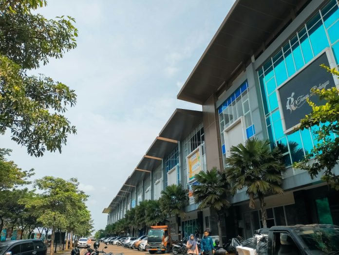 a street with cars and buildings