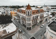 an aerial view of an old building in a city
