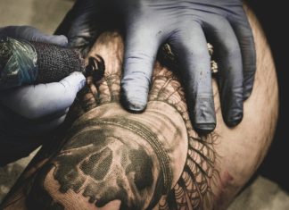a person with a tattoo on their arm