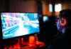 How to Build a Low-Latency Network for Real-Time Streaming person using computer playing FPS game