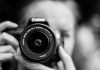 Why a Photography Course for Beginners Is the Fastest Way to Improve Your Skills person taking photo using Canon camera in shallow focus lens