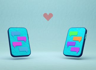 Two phones with chat bubbles and a red heart.