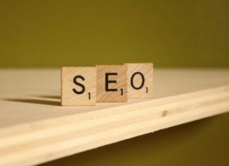 How to Choose an AI SEO Agency that Understands Search, Content, and LLM Visibility? a wooden block that says seo on it