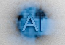 The letters ai are displayed on a blurred background.
