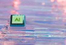 A square of aluminum is resting on glass.