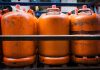 The Invisible Meter Between the Oil Well and Your Gas Tank a group of orange barrels