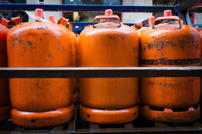 Photo by Eric Prouzet a group of orange barrels