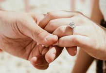Promise Rings Explained: Meaning, Etiquette and How to Choose One person holding another person's hand with ring