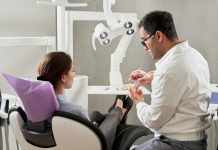 5 Key Indicators of a High-Standard Local Dental Practice man in white dress shirt sitting on black office rolling chair