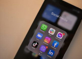 Social Media Regulations and the Push for Stronger Laws a black cell phone
