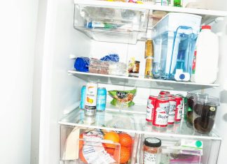 What Factors Determine the Real Cost of Refrigerator Repair Today a refrigerator filled with lots of food and drinks