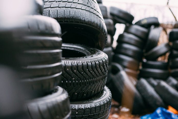 Photo by Robert Laursoo piles of car tires