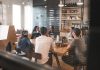 How Workplace Standards Help Businesses Stay Competitive people sitting on chair