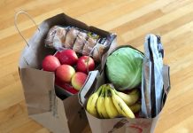 How to Start Making Food Donations apples and bananas in brown cardboard box