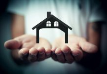 How Grant Deeds Affect Property Disputes In California Hands holding a silhouette of a house