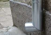 Warning Signs That Your Home Needs Professional Drain Cleaning a close up of a metal object on a wall