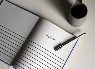 How to Turn a Big Life Question Into a Useful Journal Prompt a notebook with a pen on top of it