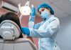 How Dental Professionals Use Botox Beyond Traditional Cosmetic Goals a woman getting her teeth brushed by a dentist