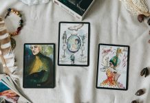 How to Read an Online Psychic Profile With a Clear Head 2 black and white cards on white textile