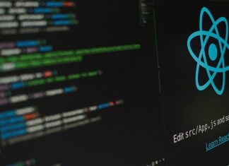Why Modern React Apps Are Built with TypeScript a computer screen with a logo on it