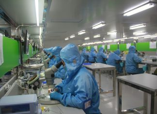 man in blue jacket wearing blue mask